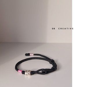 Hand braided rope with sterling silver bracelet